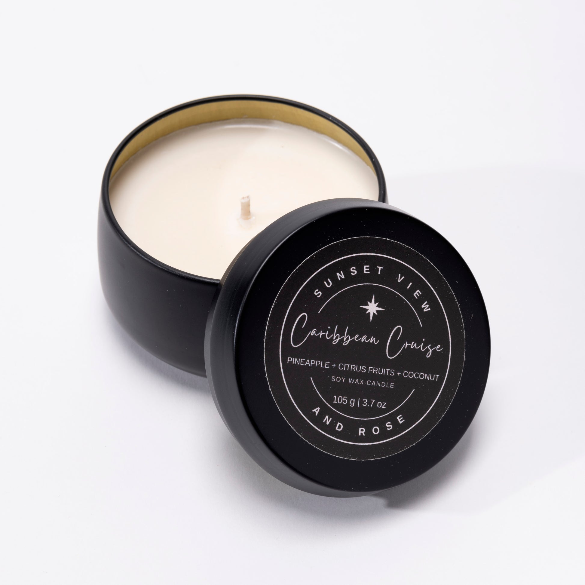 Sunset View and Rose offers a handsome matte black 3.7oz travel tin scented soy wax candle, scented with Pineapple, Citrus Fruits, and Coconut.  Our long lasting candles are made with premium nontoxic fragrance oils.  Our sustainable candles and home fragrances are handmade with love in Pittsburgh, Pennsylvania.