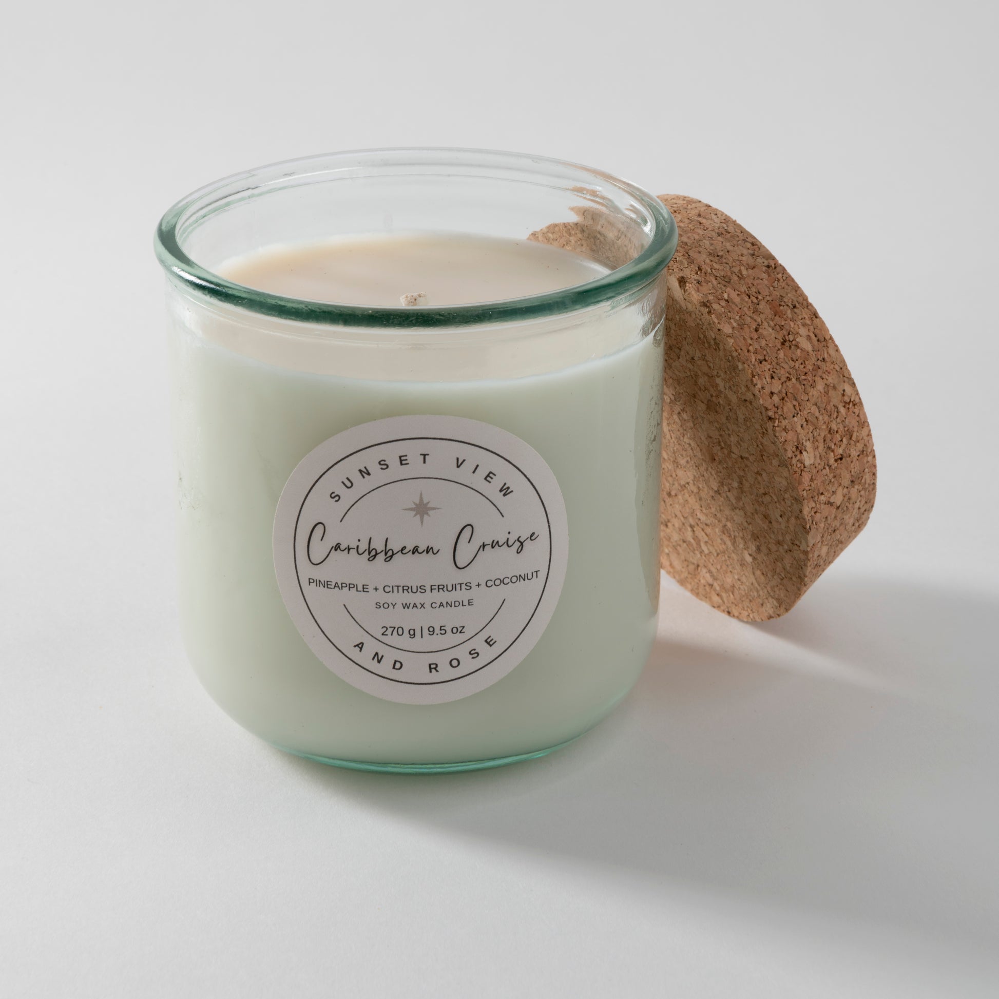 Sunset View and Rose uses a 9.5 ounce scented soy wax candle in a recycled Spanish glass jar, scented with Pineapple, Citrus Fruits, and Coconut. Our sustainable candles are made with premium fragrance oils. We craft delightful nostalgic nontoxic candles and home fragrances with environmentally friendly business practices in mind.
