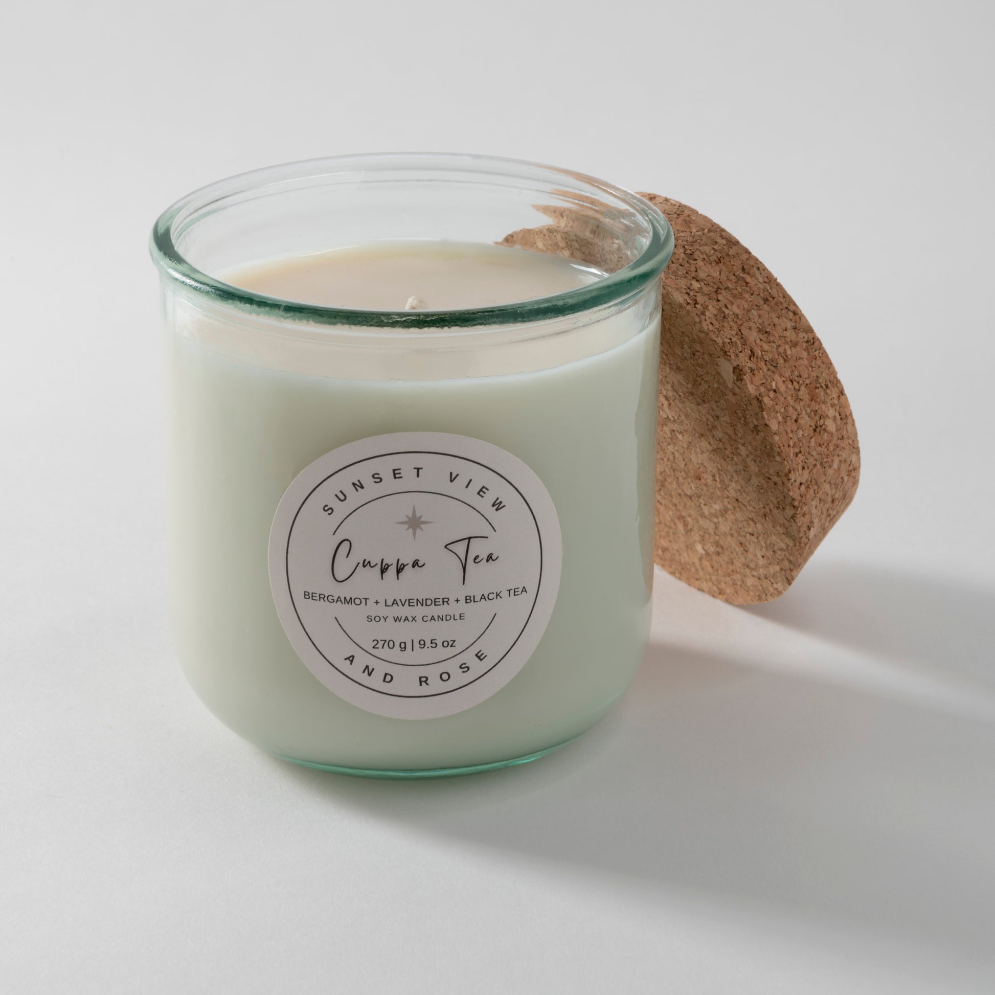 Sunset View and Rose uses a 9.5 ounce scented soy wax candle in a recycled Spanish glass jar, scented with Bergamot, Lavender, and Black Tea. Our sustainable candles are made with premium fragrance oils. We craft delightful nostalgic nontoxic candles and home fragrances with environmentally friendly business practices in mind.