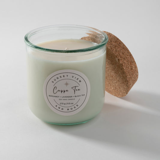 Sunset View and Rose uses a 9.5 ounce scented soy wax candle in a recycled Spanish glass jar, scented with Bergamot, Lavender, and Black Tea. Our sustainable candles are made with premium fragrance oils. We craft delightful nostalgic nontoxic candles and home fragrances with environmentally friendly business practices in mind.