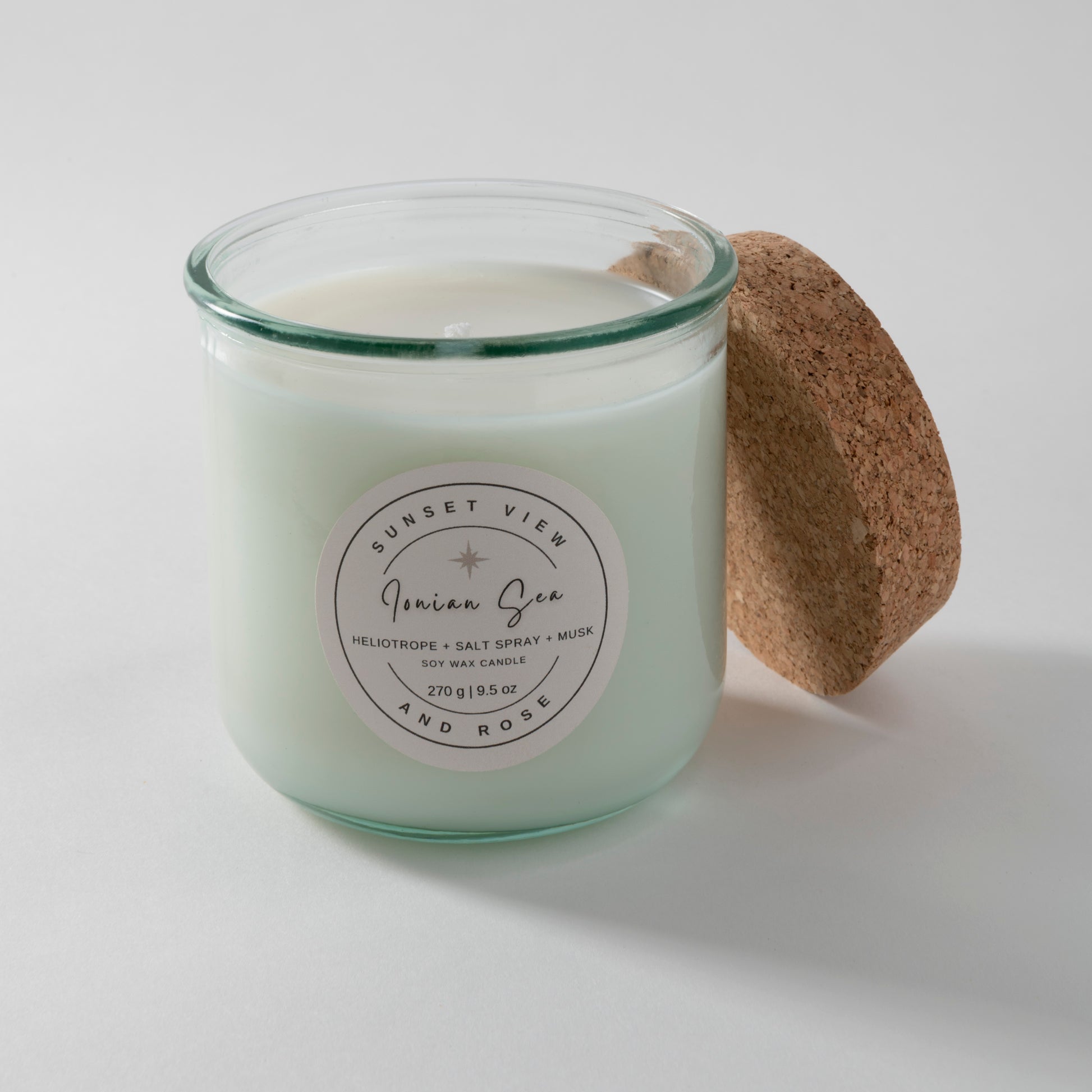 Sunset View and Rose uses a 9.5 ounce scented soy wax candle in a recycled Spanish glass jar, scented with Heliotrope, Salt Spray, and Musk. Our sustainable candles are made with premium fragrance oils. We craft delightful nostalgic nontoxic candles and home fragrances with environmentally friendly business practices in mind.