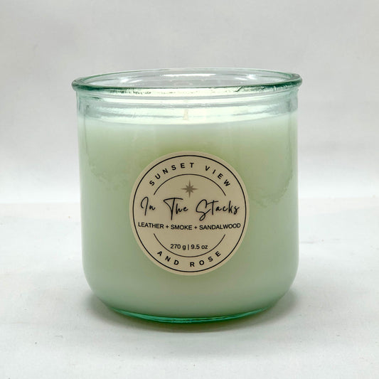 Sunset View and Rose - "In The Stacks" library scented candle.  This is a 9.5oz coconut-apricot luxury wax blend candle, sustainably made with love in Pittsburgh, Pennsylvania. 