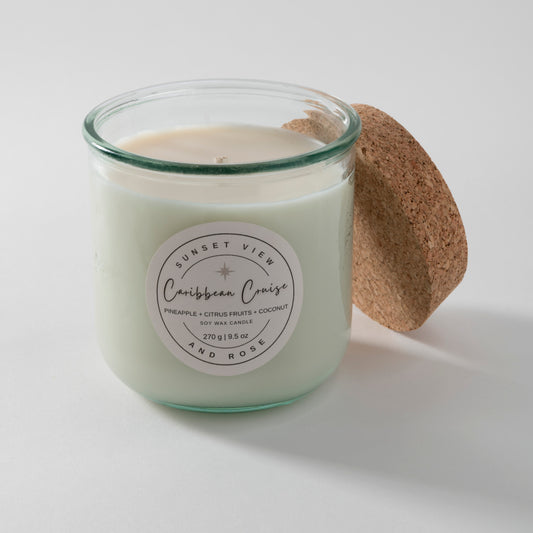 Sunset View and Rose uses a 9.5 ounce scented soy wax candle in a recycled Spanish glass jar, scented with Pineapple, Citrus Fruits, and Coconut. Our sustainable candles are made with premium fragrance oils. We craft delightful nostalgic nontoxic candles and home fragrances with environmentally friendly business practices in mind.