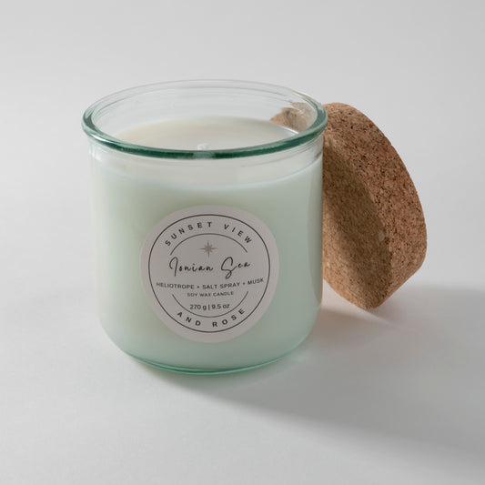 Sunset View and Rose uses a 9.5 ounce scented soy wax candle in a recycled Spanish glass jar, scented with Heliotrope, Salt Spray, and Musk. Our sustainable candles are made with premium fragrance oils. We craft delightful nostalgic nontoxic candles and home fragrances with environmentally friendly business practices in mind.